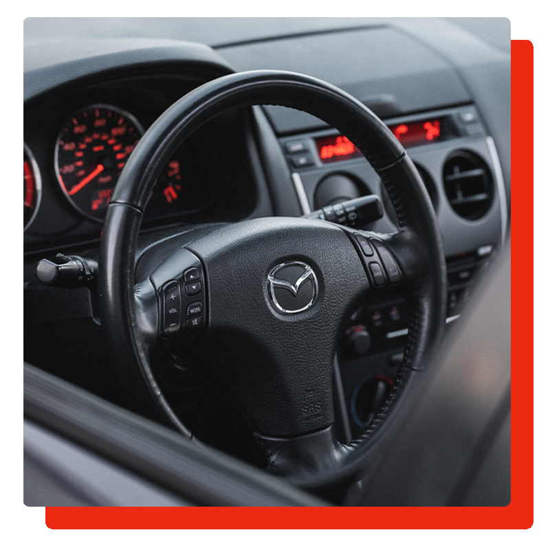 mazda steering wheel with logo and a border on the left side mazda steering wheel with logo and a border on the left side
