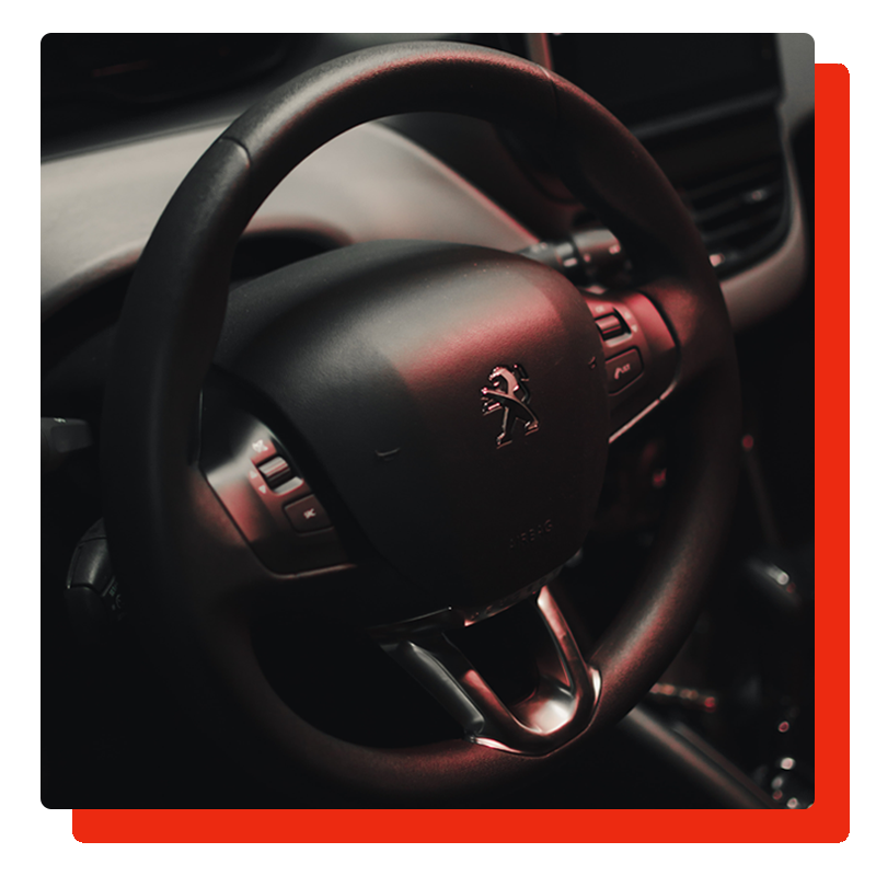 peugeot steering wheel with logo and panel, and a border on the left side peugeot steering wheel with logo and panel, and a border on the left side